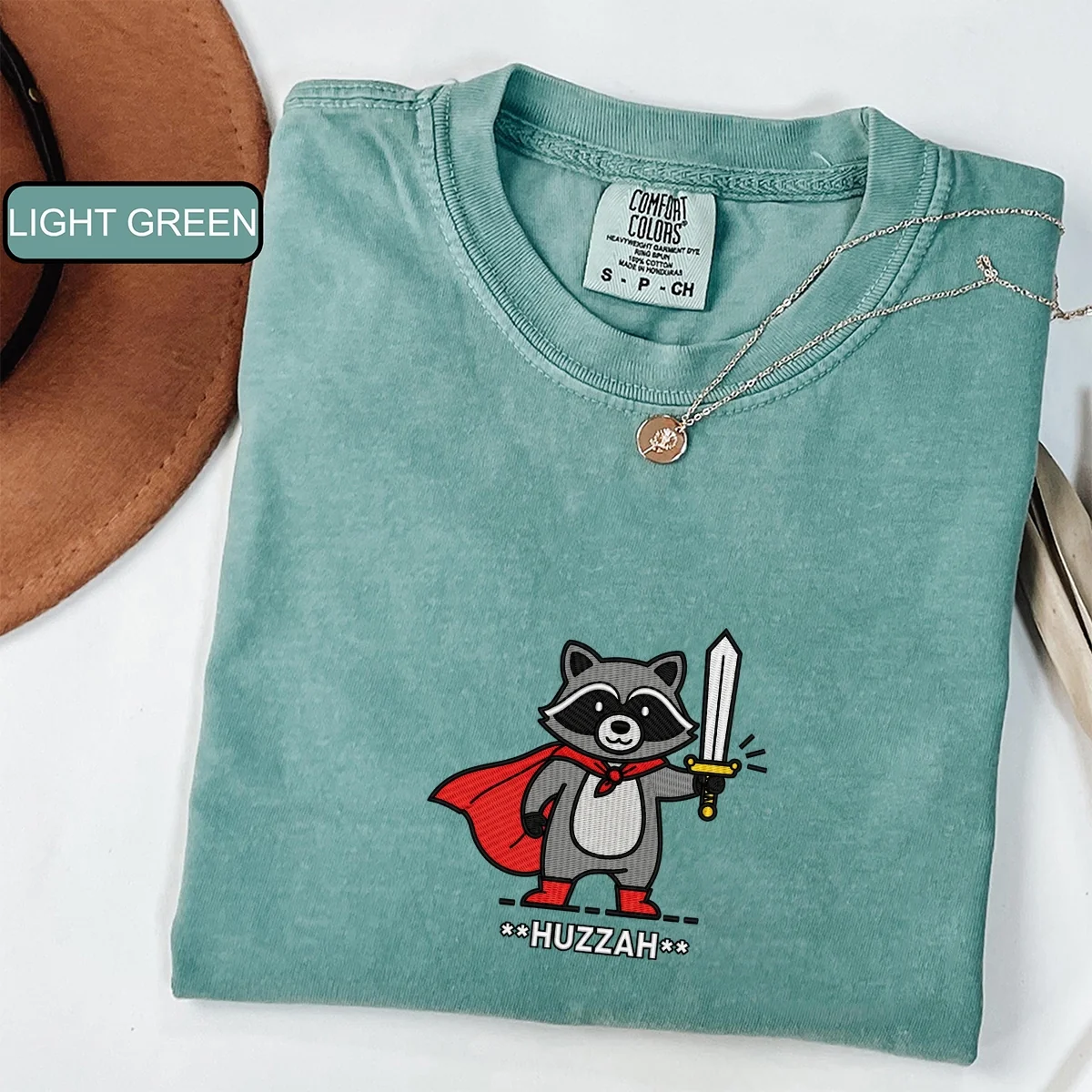 Custom Embroidered Huzzah Raccoon T-Shirt | Funny Medieval Meme Tee – Renaissance Faire & DnD Gamer Gift