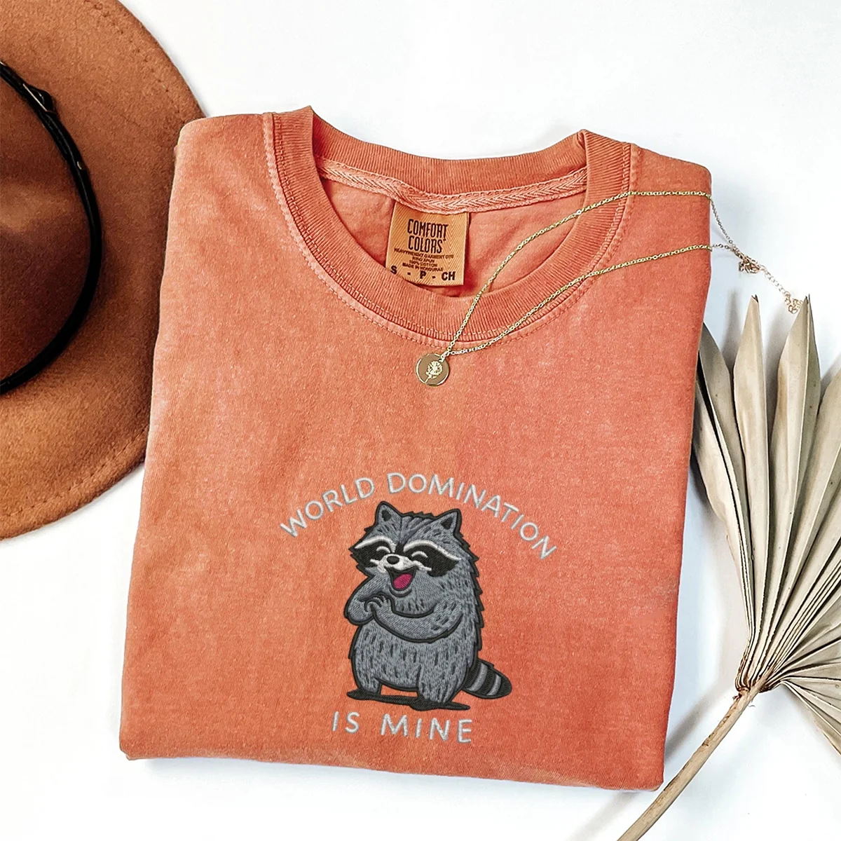 Custom Embroidered World Domination Is Mine T-Shirt – Funny Chaotic Raccoon Tee - Image 2